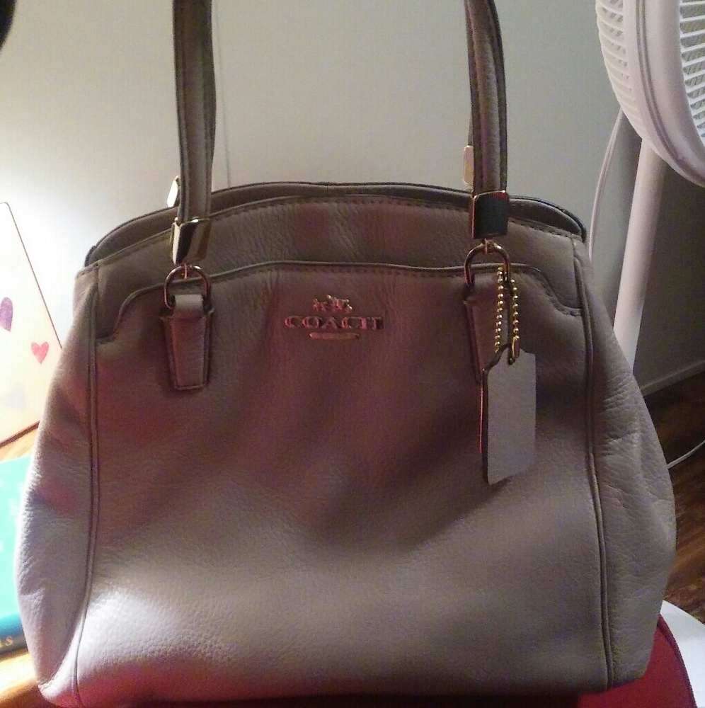 Tan leather coach purse